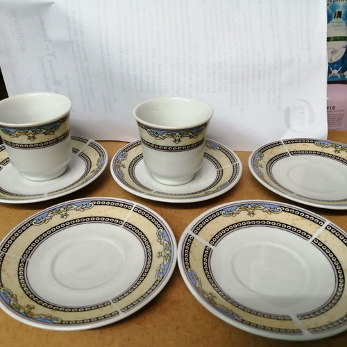 Porcelain coffee cups set of 2 with 5 saucers like new