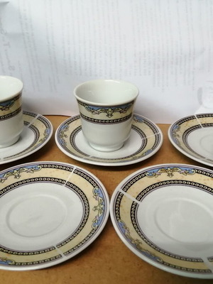 Porcelain coffee cups set of 2 with 5 saucers like new