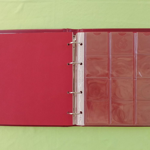 Coin album used, large size with 4 rings and 6 sleeves