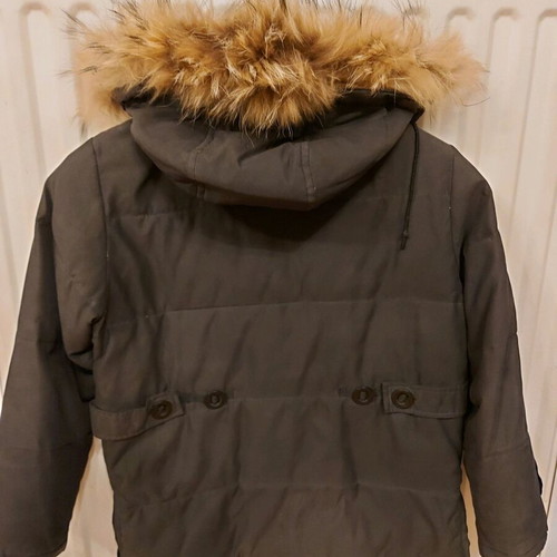 Children's warm jacket black like new, 9 years old