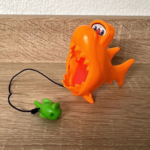 Chupa Chups Piranha toys used, orange with green fish