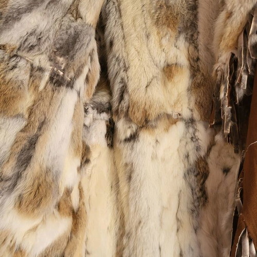 Women's short brown fur coat with castor like new