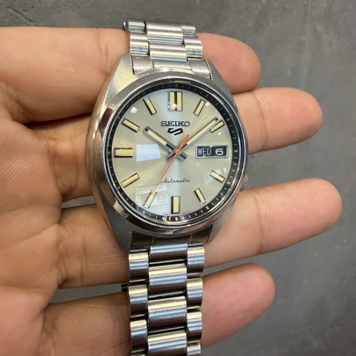 Seiko 5 Sports SNXS Series Automatic watch with silver stainless steel bracelet