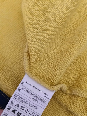 Benetton yellow jacket for 10 years like new