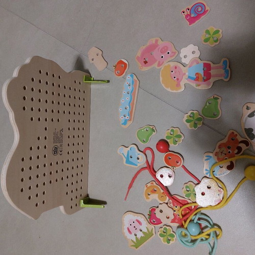 Montessori wooden toy like new for fine motor skills practice