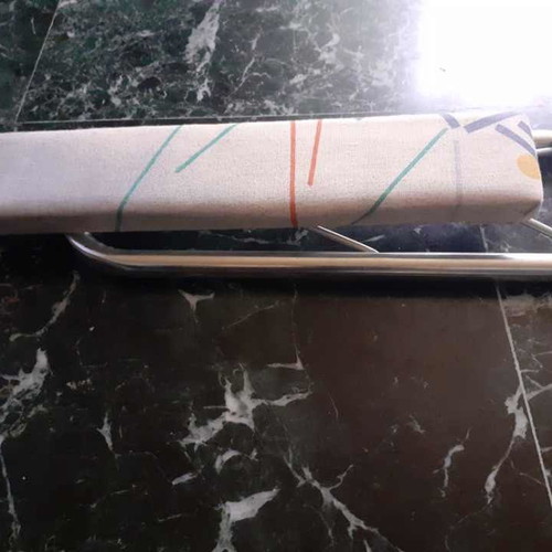 Small ironing board used for details, sleeves and collars