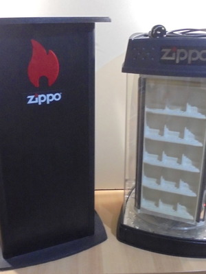 Zippo lighter display stand used, illuminated and rotating with storage base for 60 lighters