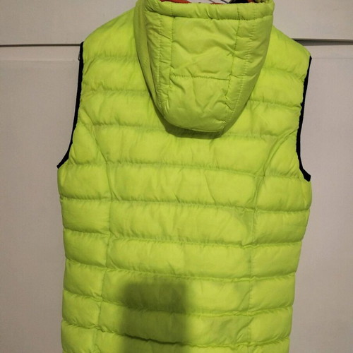 Sleeveless jacket used, size medium, yellow