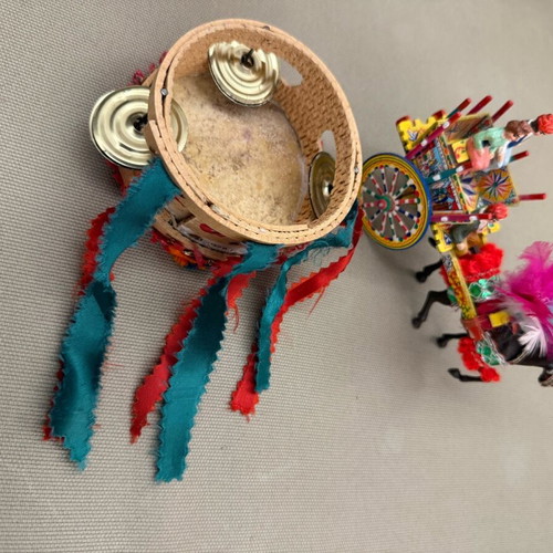 Vintage Sicilian cart with horse and tambourine decoration