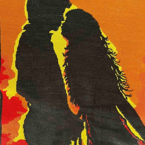 Handmade embroidered textile painting like new, silhouette of a couple at sunset