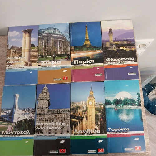 Loney Planet travel guides like new pack of 42
