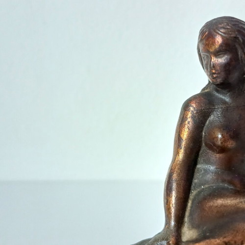 Vintage bronze Little Mermaid statue on natural stone used