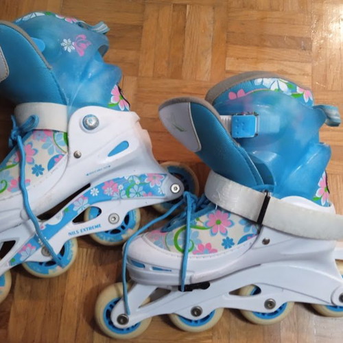 Skate rolls NILS Extreme ABEC5 adjustable size 34-37 like new