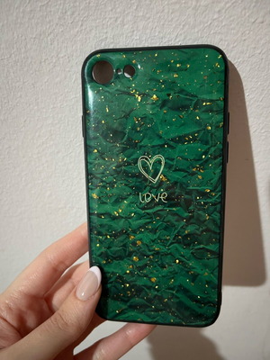 iPhone 8 case used with green design and gold details