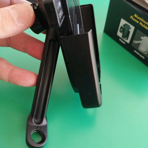 Metal phone holder for motorcycles like new, screws on mirror