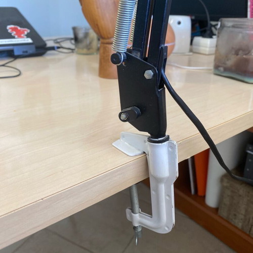 Black screw-on desk lamp used, industrial design