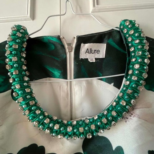 Allure dress like new, green with integrated rhinestone necklace, size M