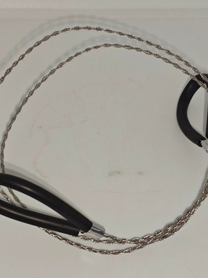 Survival saw like new, stainless steel with ergonomic handles