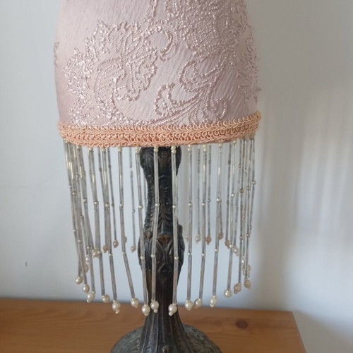 Decorative body like new with embossed designs and fringes