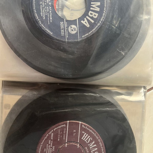 Vinyl 45 rpm records used, two cases with over fifty laiko and rembetika
