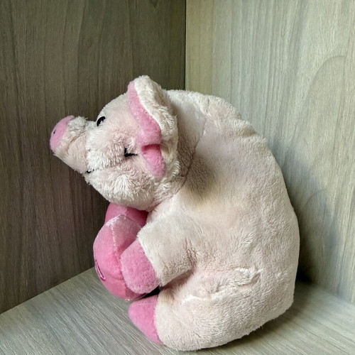 Small pink plush pig toy