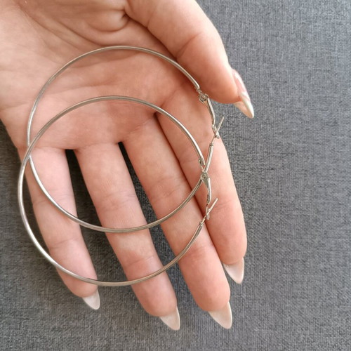 Surgical steel hoop earrings like new, silver color