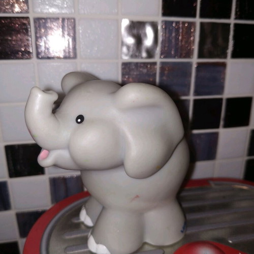 Little People Fisher Price used, 2001, with scratches on ear