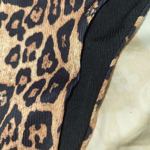 Swimsuit with leopard print and black stones used, size S