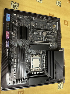 Intel i5-13600K processor, ASRock Z790 P Lightning DDR5 motherboard, Deepcool LS720 SE water cooling