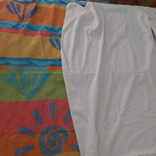 Beach and bath towels like new, 2 large, white and printed