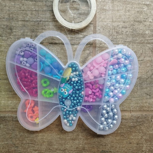 Colored beads used with thread, incomplete set