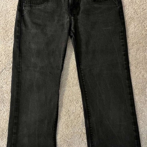 Levi's 570 black jeans used, low-waist with faded effect