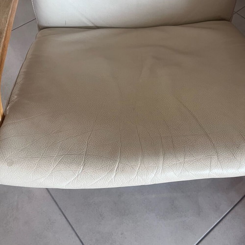 IKEA armchair used with beige leatherette cushion