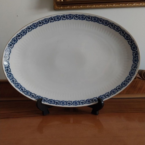 Porcelain like new, 2 Limoges salad bowls and 2 Sherzer platters