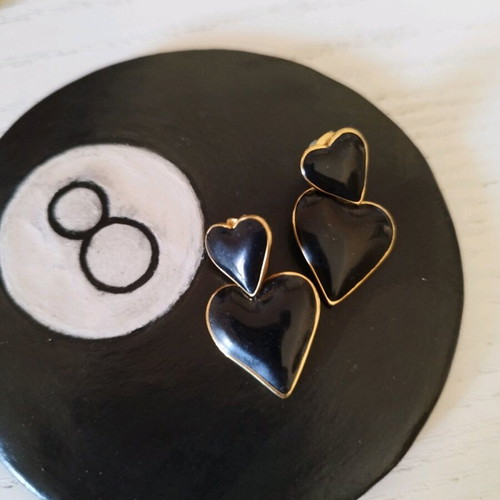 Heart-shaped dangle earrings like new, black with gold outline stainless steel