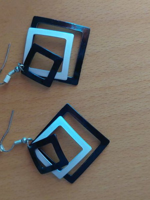 Geometric dangle earrings like new, black and white