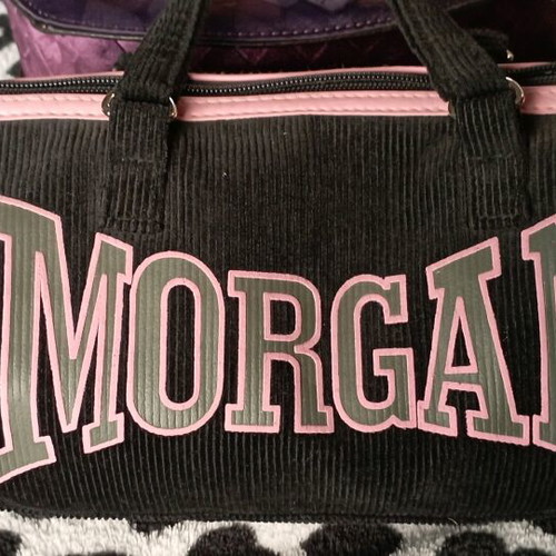 Morgan hand bag like new, corduroy black and pink