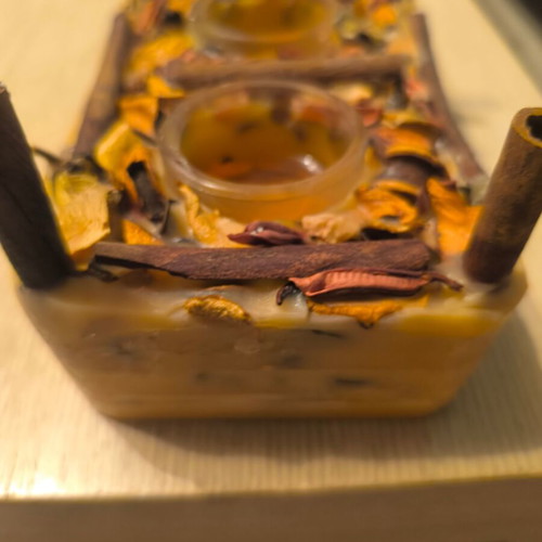 Handmade rectangular candle with aromatic potpourri like new