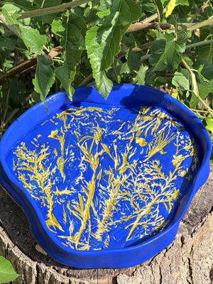 Handmade clay dish with floral design