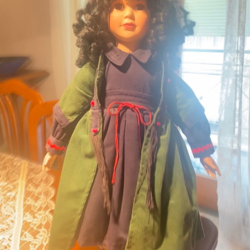 Porcelain doll like new from collection