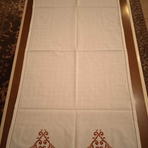Handmade white embroidered table runner tzevres in terracotta-brown shades
