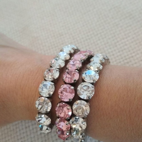 Set of three tennis bracelets like new, pink and white
