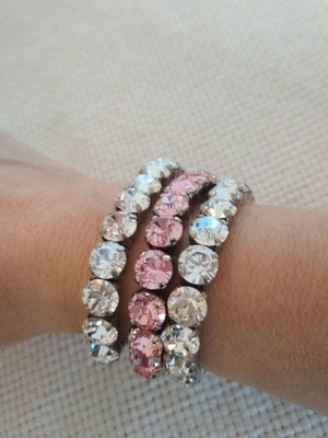 Set of three tennis bracelets like new, pink and white