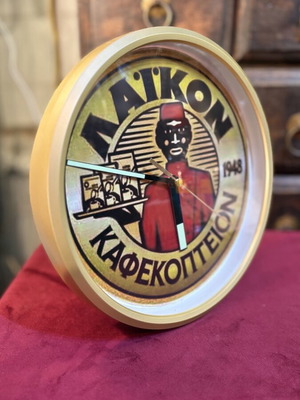 Rhythm wall clock with Laiko Kafekopteion theme