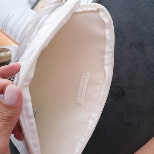 Tablet bag with slight wear on strap