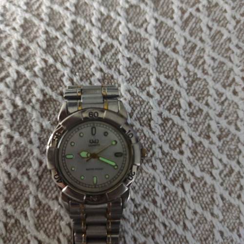 Q&Q wristwatch used, men's with luminous hands