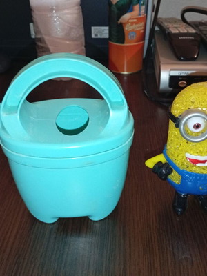 Vintage toy watering can used with minion figure made in Italy