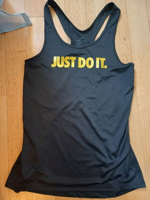 Nike Dri-Fit elastic women's top black with gold logo like new, Small