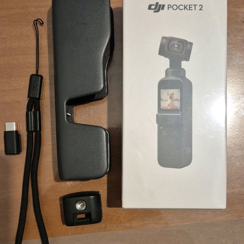 DJI Osmo Pocket 2 new with tripod selfie stick and phone mount
