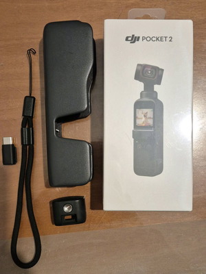 DJI Osmo Pocket 2 new with tripod selfie stick and phone mount